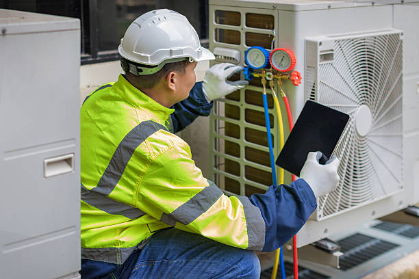 Professional Air Duct Cleaning technician working in West Point, UT